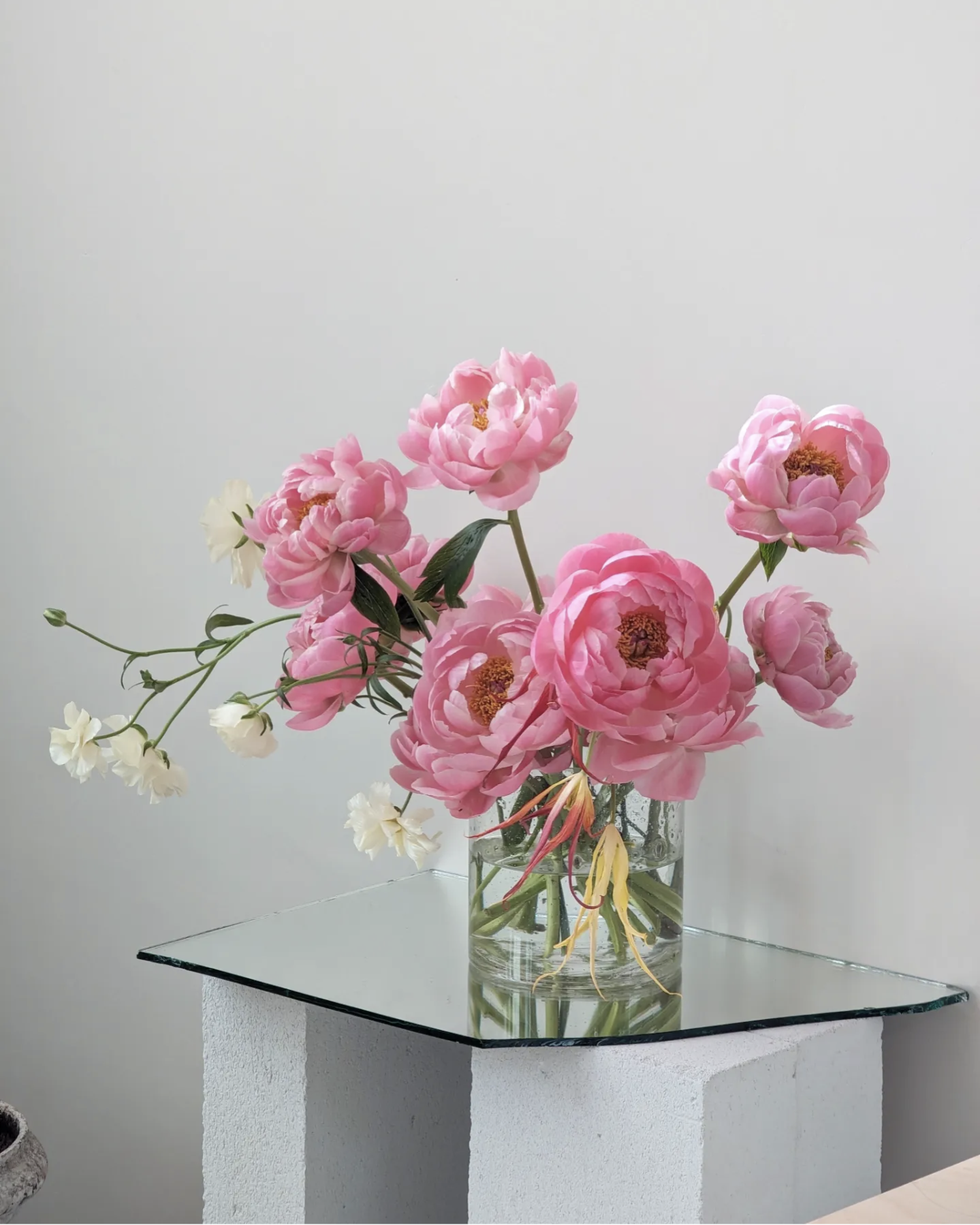 Floral arrangement with vase