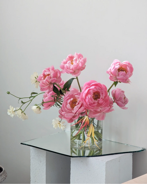Floral arrangement with vase